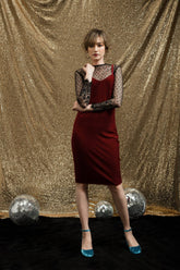 Velvet slip dress with figure-skimming fit and sheer lace sleeves for elegant layering looks
